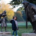 Two statues were standing in the park