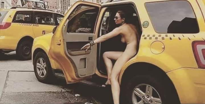 A Woman, Stark Naked, Jumped Into A Taxi