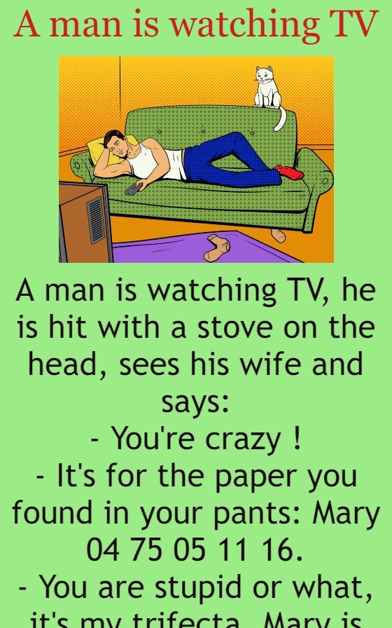 A man is watching TV