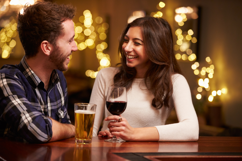 Men and women go on a night date in winter