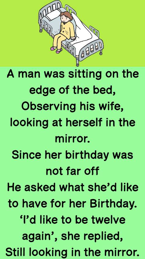 A man was sitting on the edge of the bed