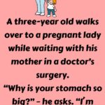 A three-year old walks over to a pregnant lady